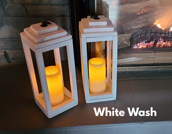 Hanging Wedding Lantern Candle Holders - finished in White Wash with L.E.D. Candles beside Fireplace